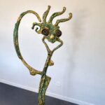 Sculpture contemporaine « Je me Marre » de l’artiste français Nico Tournaire en bronze patiné avec pierres Septaria, œuvre d’art expressive et poétique.